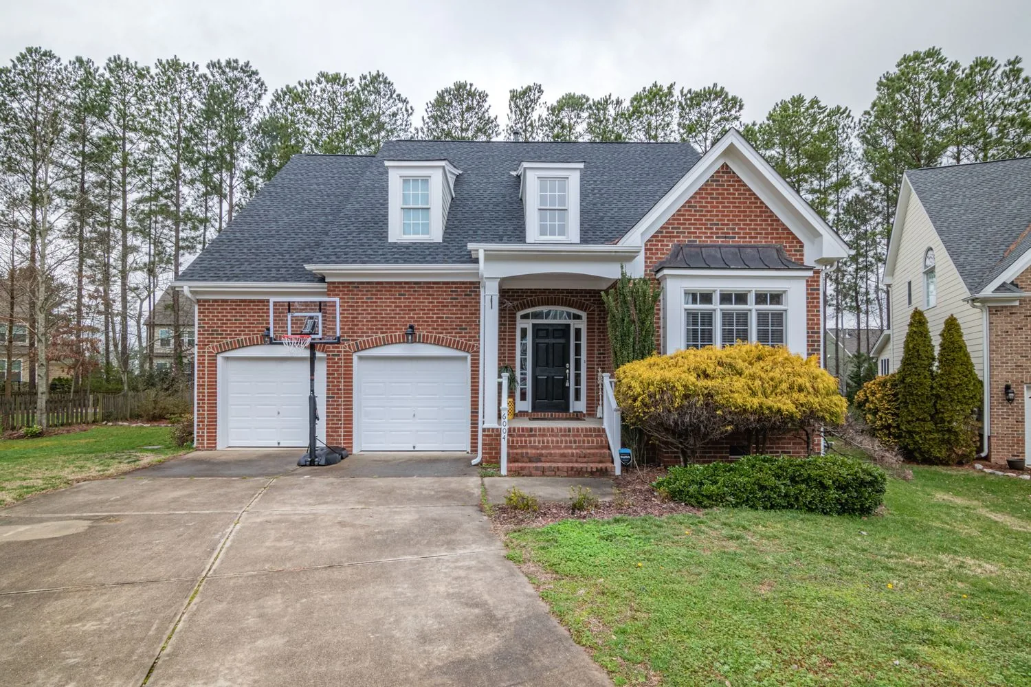Brick suburban home with a two-car garage